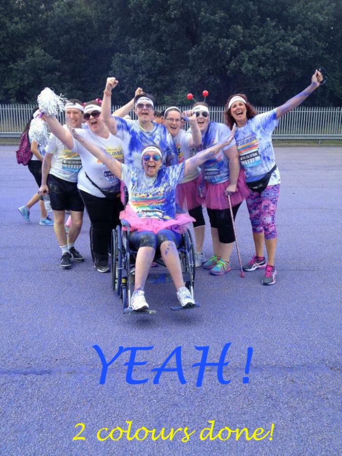 Part of team BAM 4 MS-UK after the 2 of the joggers went ahead Back row, left to right: Mike, Giggler, Deb, Angie, Me, Sharon Bottom row: Sare taking her turn in ‘Wilma’ wheelchair