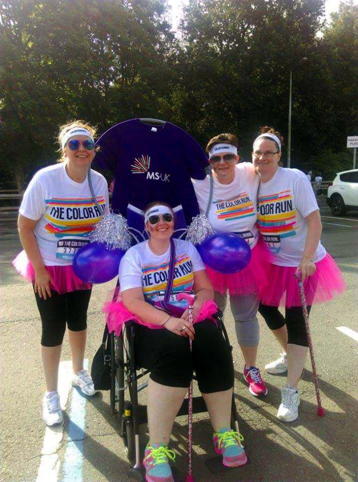 </em> Me & my MegaSpecials Sarah & Angie, plus Debbie (top middle) before race. Face paint & tutus on, chair decorated. Lets do this! *MegaSpecial = awesome people that have MS* </em>